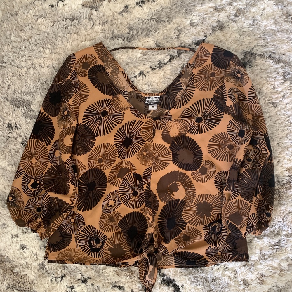 Manuhealii tops